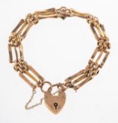 A gate bracelet, with heart padlock and safety chain, heart padlock marked 9ct to verso,