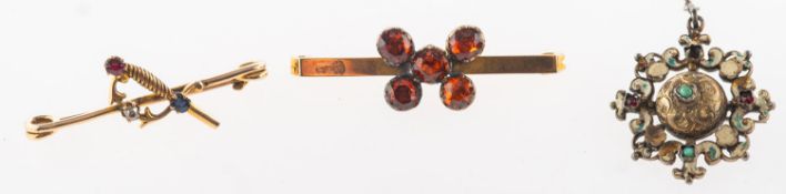 A group of three antique brooches, including a bar brooch,