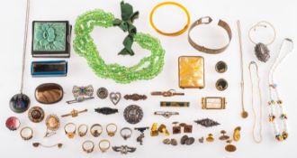 A mixed group of costume and silver jewellery and items of interest,