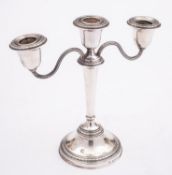 An Elizabeth II silver three sconce candelabrum by Adie Bros Ltd, Birmingham 1956,