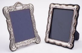 An Elizabeth II arch top silver photograph frame by D.R& S, Birmingham 1969, 20x14.
