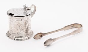 A Victorian silver drum mustard, marks almost rubbed out, London, with engraved decoration,