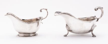A George V silver sauce boat maker's mark rubbed, London 1912, open C scroll handle,