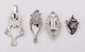 A mixed group of silver napkin clips including; a foxhead on a shield by Thomas Henry Vale,