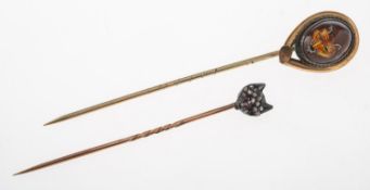 Two fox head stick pins, including an Essex crystal hand painted fox head gilt stick pin,