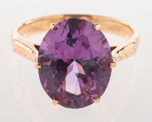 A synthetic alexandrite pendant and ring,