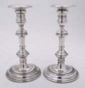 A pair of Elizabeth II silver candlesticks by William Comyns & Sons Ltd, London 1958,