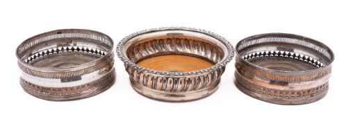 A pair of George III Sheffield plate decanter coasters, not marked, reeded rim, pierced border,