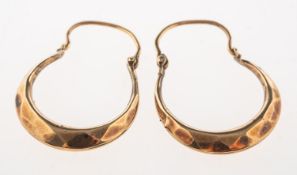 A pair of 9ct gold faceted hoop earrings, UK hallmark, 1.