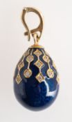 A blue enamelled egg pendant of 'Faberge style',