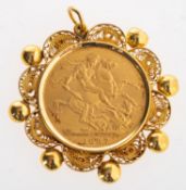 A full sovereign in pendant mount, A Victoria 1887 full sovereign in filigree pendant mount,