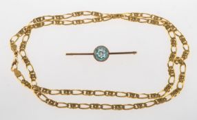 A blue topaz set brooch and a chain,