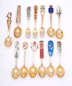 A collection of thirteen Danish silver gilt and enamel Christmas spoons by Anton Michelsen,