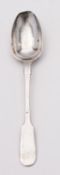 An early 19th century Chinese export silver tea spoon, maker unknown, Fiddle pattern, 13cm.