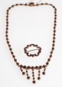 A Bohemian garnet necklace and brooch,