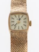 Tissot, a vintage lady's 9ct gold wristwatch, with square shaped face and mesh bracelet,