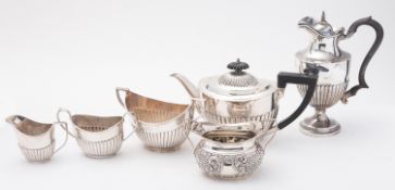 A group of silver tea wares including; a tea pot by Roberts & Belk, Sheffield 1905,