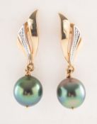 A pair of Tahitian pearl and diamond drop earrings,