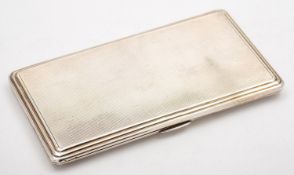 A George VI silver cigarette case by Smith & Bartlam, Birmingham 1941, of rectangular form,
