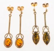 Two pairs of 9ct gold amber drop earrings, including a pair of Celtic style drop earrings,