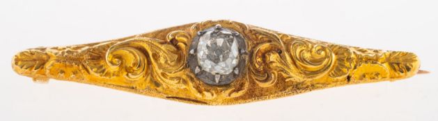 A Victorian diamond brooch, of navette and ornate foliate carved form,