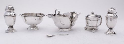 A mixed group of silver including; a Scottish two handled sauce boat by Hamilton & Inches,