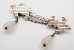 A Henry Ellis patent safety chain and silver kilt/shawl pin by Hilliard & Thomason, Exeter,