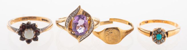 A group of four rings, including a 9ct gold garnet and opal cluster ring, UK hallmark, size N1/2, 2.