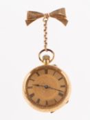 A lady's 18K gold open-faced pocket watch with a 9K gold bow the gold dial with matted and engraved