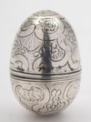 An 18th century Continental silver snuffer grater, unmarked, egg shaped, with screw off lid,
