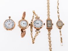 A gold pocket watch and four lady's 9K gold wristwatches to include: A 9K gold fob watch,