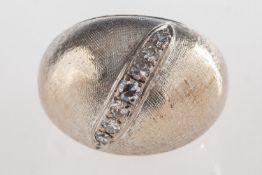 A diamond bombé ring,