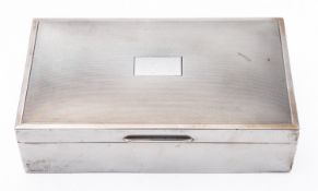 A George VI silver cigarette casket by E & N Speak, Birmingham 1951,