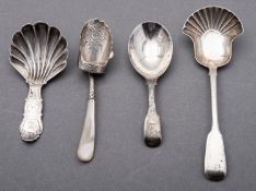 A mixed group of four silver caddy spoons including;
