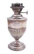 A Victorian silver oil lamp base by William Charles Fordham & Albert Buckley Faulkner, London 1896,
