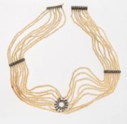 An antique eight row seed pearl and diamond choker, eight rows of seed pearls,