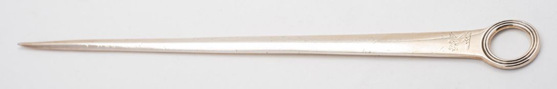 A George III silver meat skewer by George Smith, London 1812, with reeded ring, engraved crest,