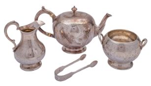 A Victorian silver three piece silver bachelor's tea service by Robert Harper, London 1866,