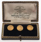A boxed set of three 18ct gold dress studs, with monogrammed initials 'CGF', UK hallmark,