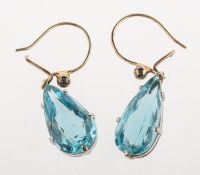 A pair of aquamarine drop earrings, each claw set with a pear-shaped aquamarine, hook fittings,