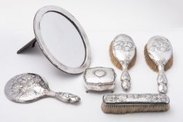 An Edward VIII silver four piece dressing table set by Henry Matthews, 1906,