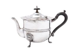 An Edward VII silver tea pot by Stokes & Ireland Ltd, Chester 1909,