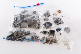 A large quantity of mixed wristwatch parts including dials, cases,
