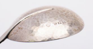 An Arts & Crafts silver caddy spoon by The Artificers' Guild, London 1923,