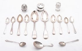 A mixed group of silver flatware including; a pair of London Fiddle pattern dessert spoons,