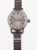 Omega, a lady's 1970's stainless steel wristwatch, on a stretch bracelet, model ref ST 535006,