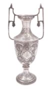 An impressive early 20th Persian silver two handled vase, possibly Isfahan, Iran,