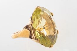 A 9ct gold cocktail ring, set with an oval mixed-cut green quartz, approx. 35.