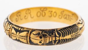 A George II memento mori skeleton ring, with black enamelling and carved with a full skeleton,