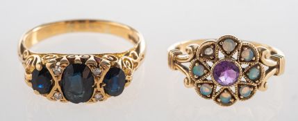 Two rings, including a cluster style ring,